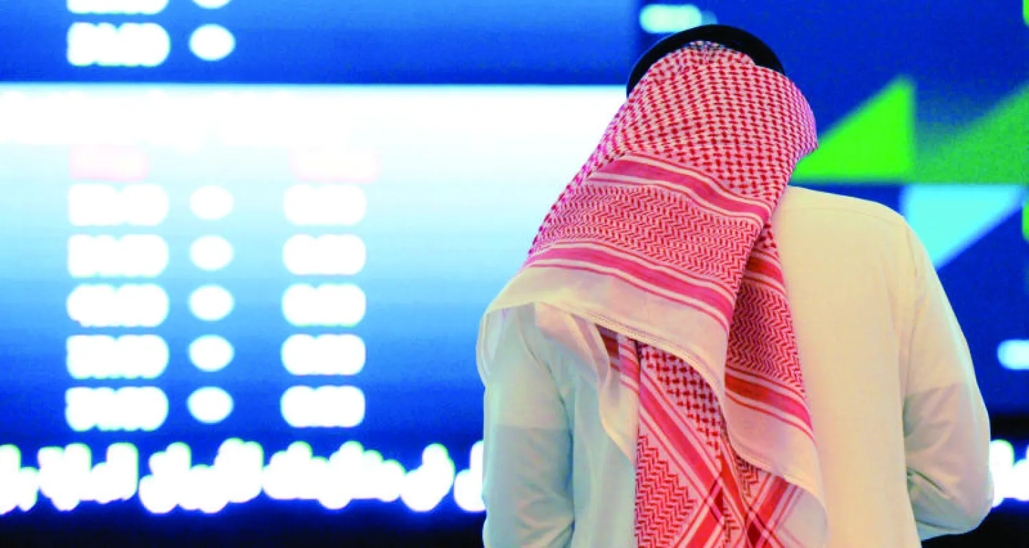 مؤشر سوق الأسهم السعودية عاش مرحلة ملتهبة من التذبذب العالي ما بين الارتفاع والانخفاض (أ.ف.ب)