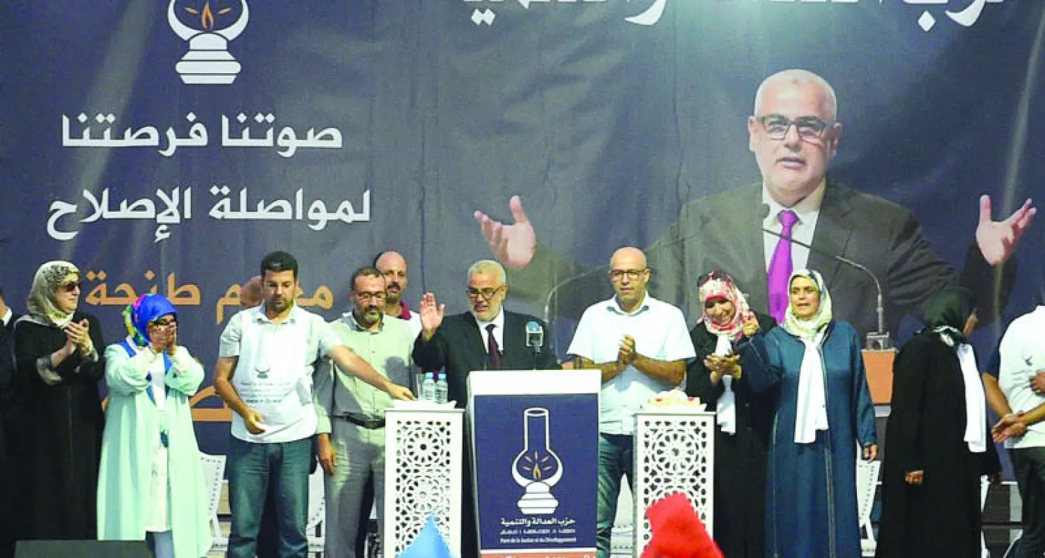 رئيس الحكومة المغربية عبد الاله ابن كيران خلال المهرجان الخطابي في طنجة أمس (أ.ف.ب)