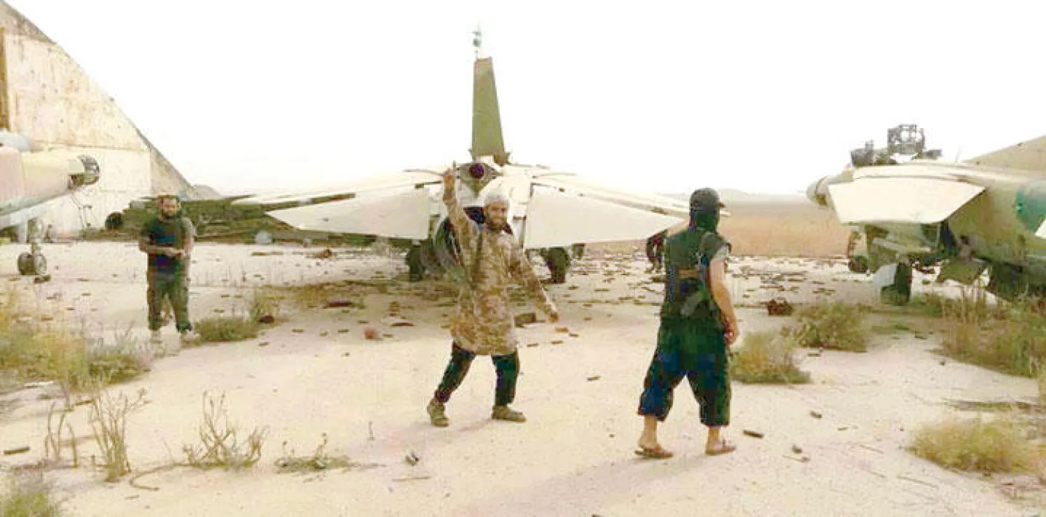 صورة نشرتها مواقع المعارضة بعد سيطرتها على مطار أبو الظهور العسكري في إدلب أمس