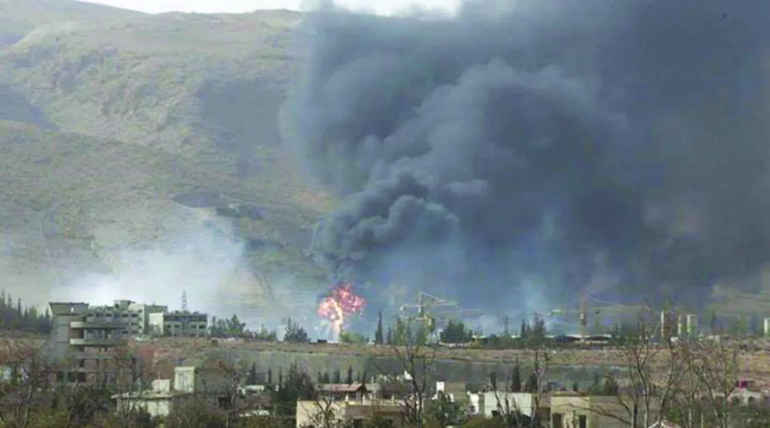 مشهد لأحد الانفجارات من المعارك بين المعارضة وقوات الأسد بالقرب من أوتوستراد حمص - دمشق الدولي (تصوير: ‎تجمع ثوار سوريا)