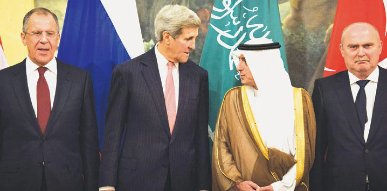صورة تذكارية قبل انطلاق الاجتماع الرباعي حول سوريا أمس الخميس في فيينا ويبدو من اليمين وزراء خارجية تركيا والسعودية وأميركا وروسيا (أ.ب)