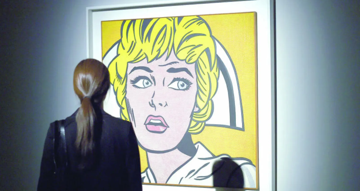 تركز دور المزادات جهودها على نحو متزايد للفت انتباه جامعي المقتنيات الفنية من الشباب (أ.ف.ب)