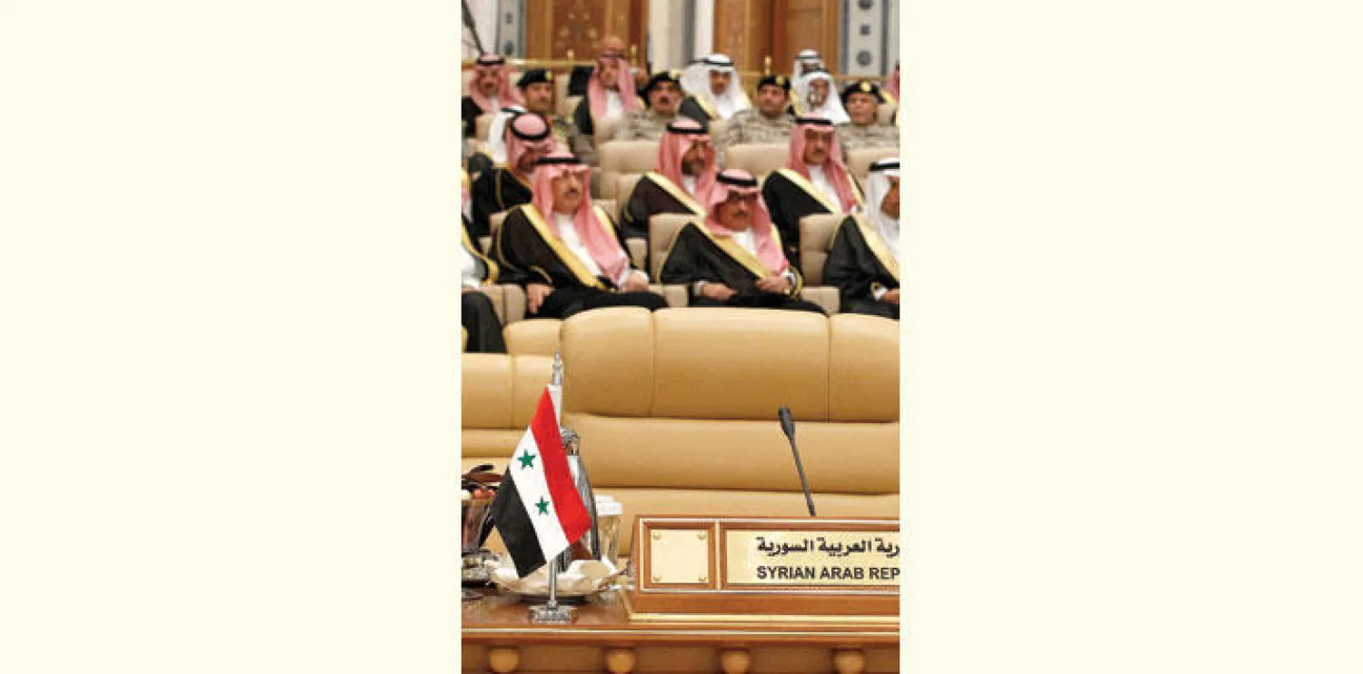 المقعد السوري شاغرا خلال القمة (إ.ب.أ)