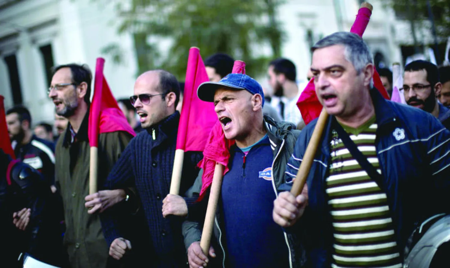 الاقتصاد اليوناني يعاني من أزمة استمرت أكثر من خمس سنوات تهدد من جديد استقرار منطقة اليورو وتطرح فكرة خروج اليونان من المنطقة الاقتصادية (أ.ف.ب)