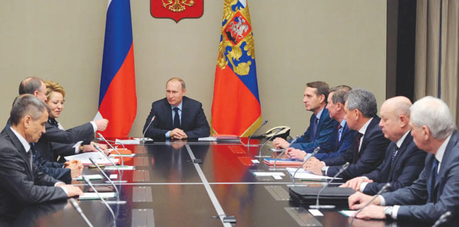 الرئيس فلاديمير بوتين أثناء ترؤسه مجلس الأمن الروسي في موسكو أمس (أ.ب)