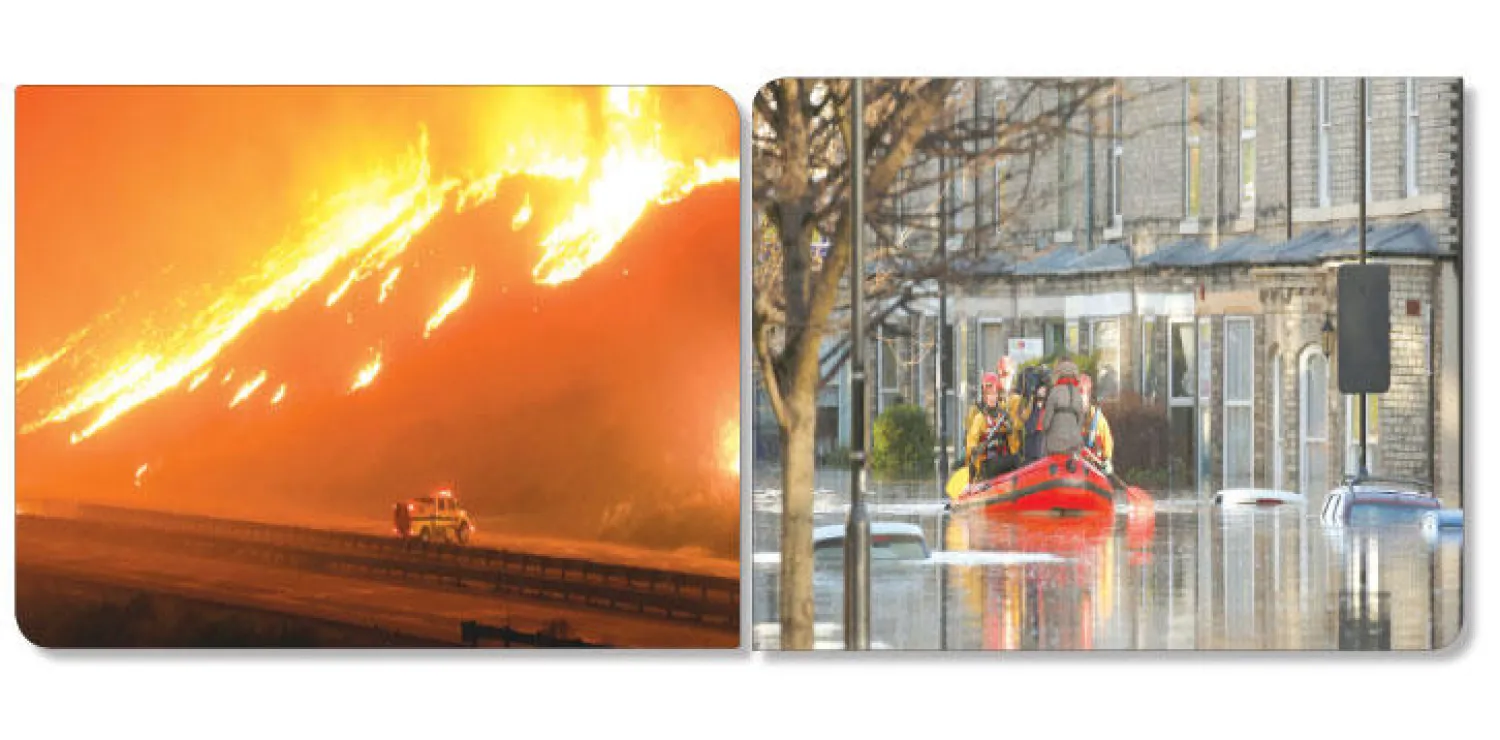 فرقة خدمات الطوارئ تجوب شارعا غمرته المياه في مدينة يورك، شمال إنجلترا أمس (رويترز)، النيران تغلق الطريق السريع الساحلي الرئيسي في جنوب كاليفورنيا وإجلاء عشرات المنازل (أ.ب)