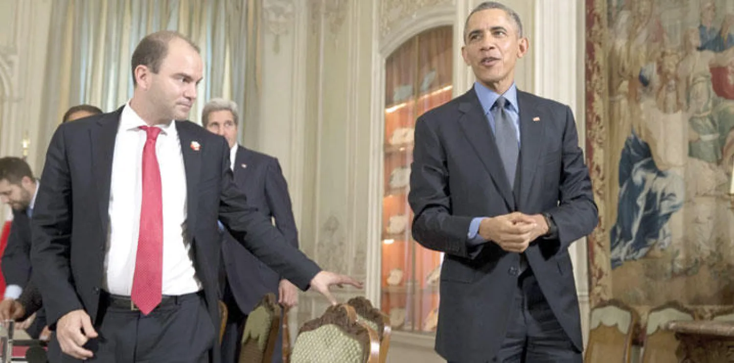 الرئيس الأميركي باراك أوباما ونائبه للأمن القومي في لقطة عقب هجمات باريس نوفمبر الماضي (نيويورك تايمز)