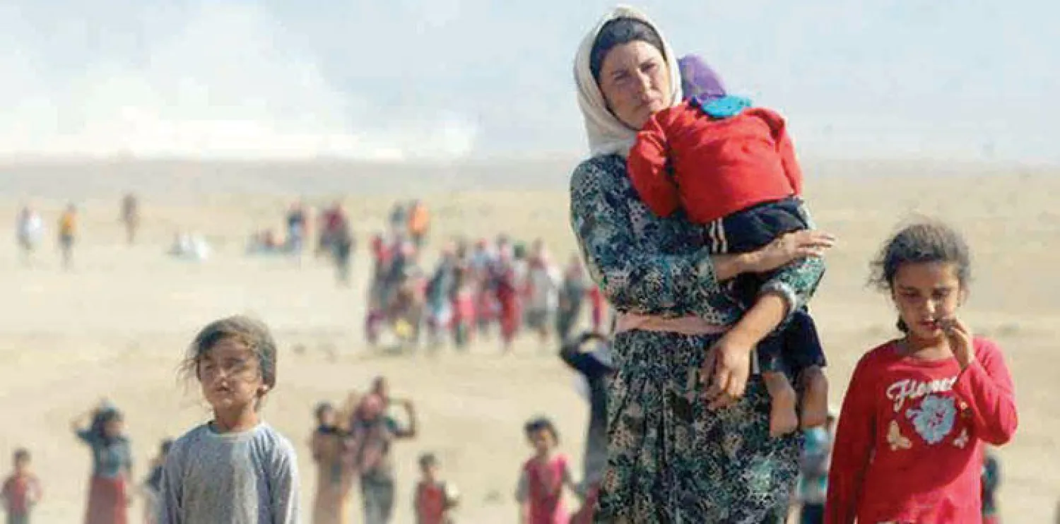 فظائع «داعش» نتج عنها تشريد آلاف الأسر بين سوريا والعراق («الشرق الأوسط»)