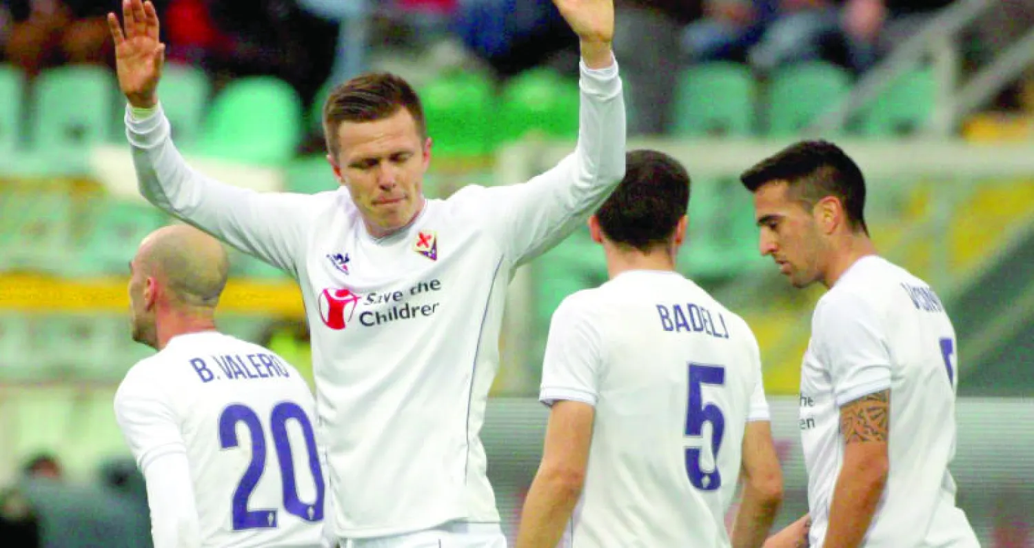 إيليسيتش لاعب فيورنتينا يحتفل بهدفيه (إ.ب.أ)