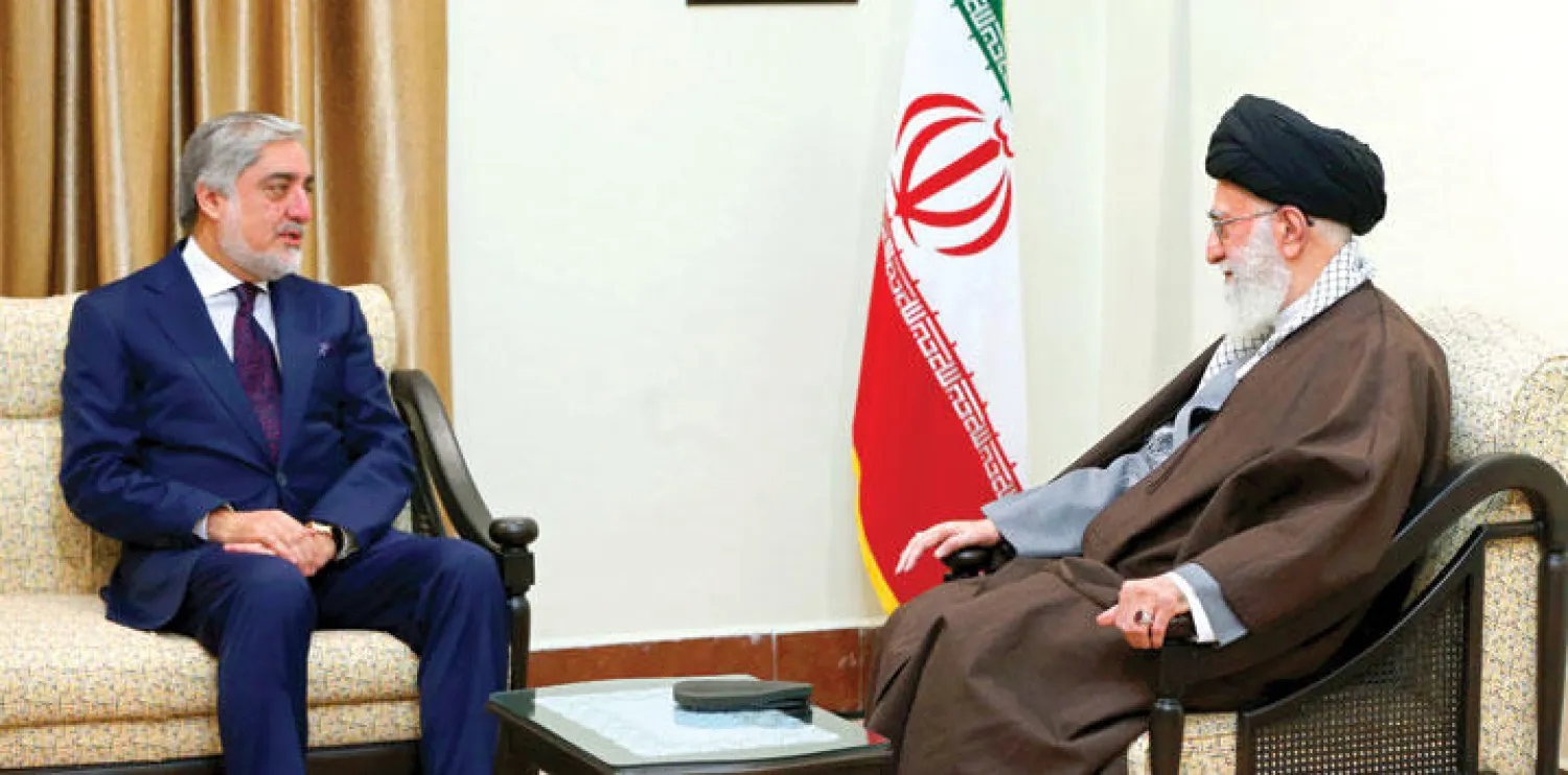 خامنئي لدى استقباله وزير خارجية أفغانستان السابق عبد الله عبد الله خلال هذا الشهر (أ.ف.ب)