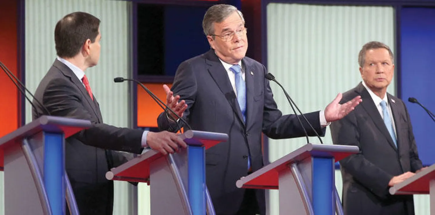 مناظرة تلفزيونية للمرشحين عن الحزب الجمهوري إلى البيت الأبيض وهم من اليمين: جون كاشيك وجيب بوش وماركو روبيو (أ.ف.ب)