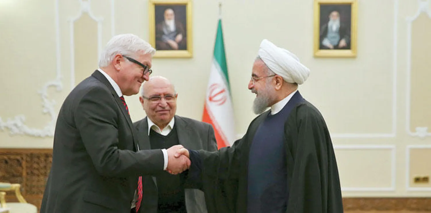 الرئيس روحاني خلال لقائه وزير الخارجية الألماني فرانك فالتر شتاينماير (رويترز)