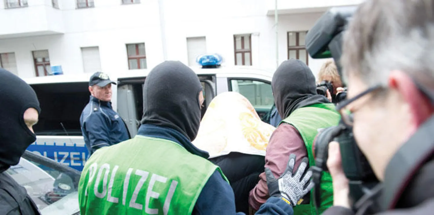 اعتقال أحد المشتبه بهم بعد سلسلة مداهمات في برلين أمس (إ.ب.أ)