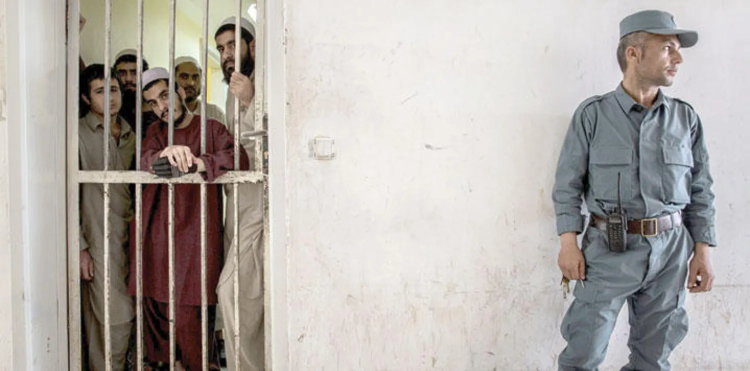 متهمون بالتجارة بالأفيون في سجن زراتج عاصمة إقليم نيمروز (نيويوك تايمز)