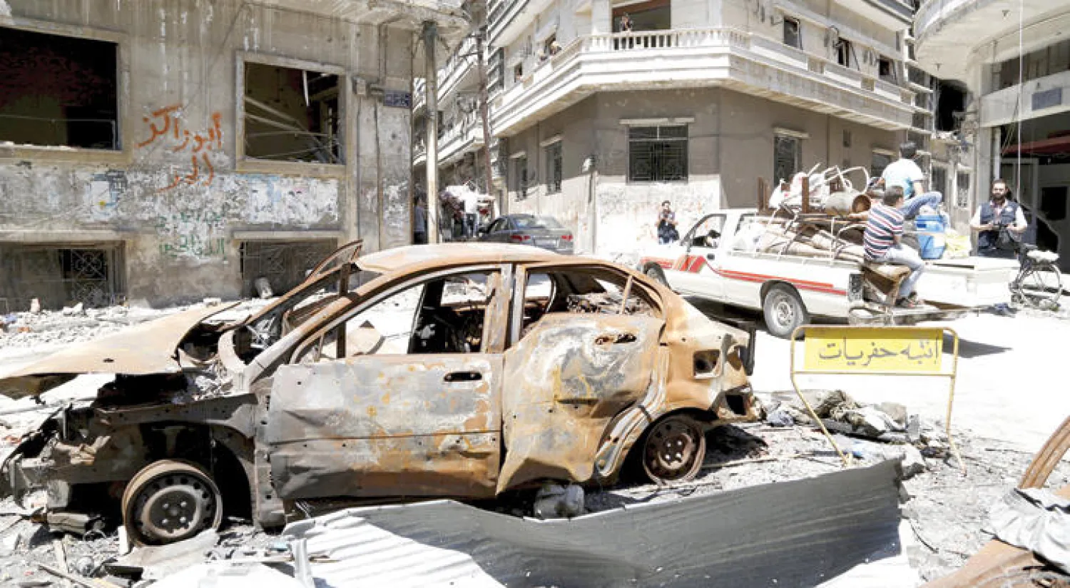 مظاهر الدمار بحمص خلال مواجهات سابقة بين قوات النظام والمعارضة (رويترز)