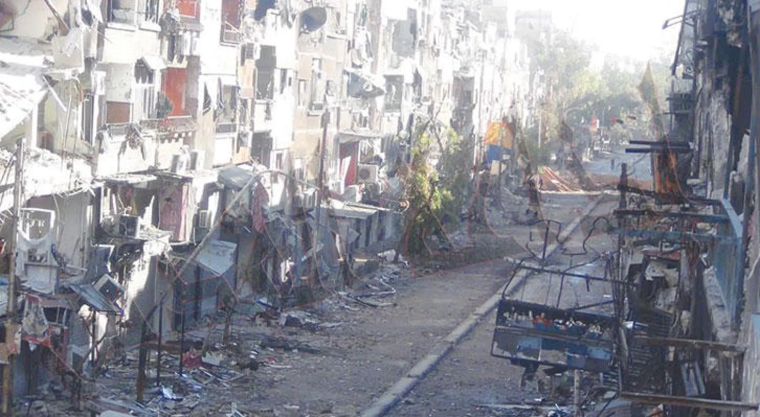 صورة نشرها موقع {مجموعة العمل من أجل فلسطينيي سوريا} لمخيم اليرموك الذي دمرته المعارك