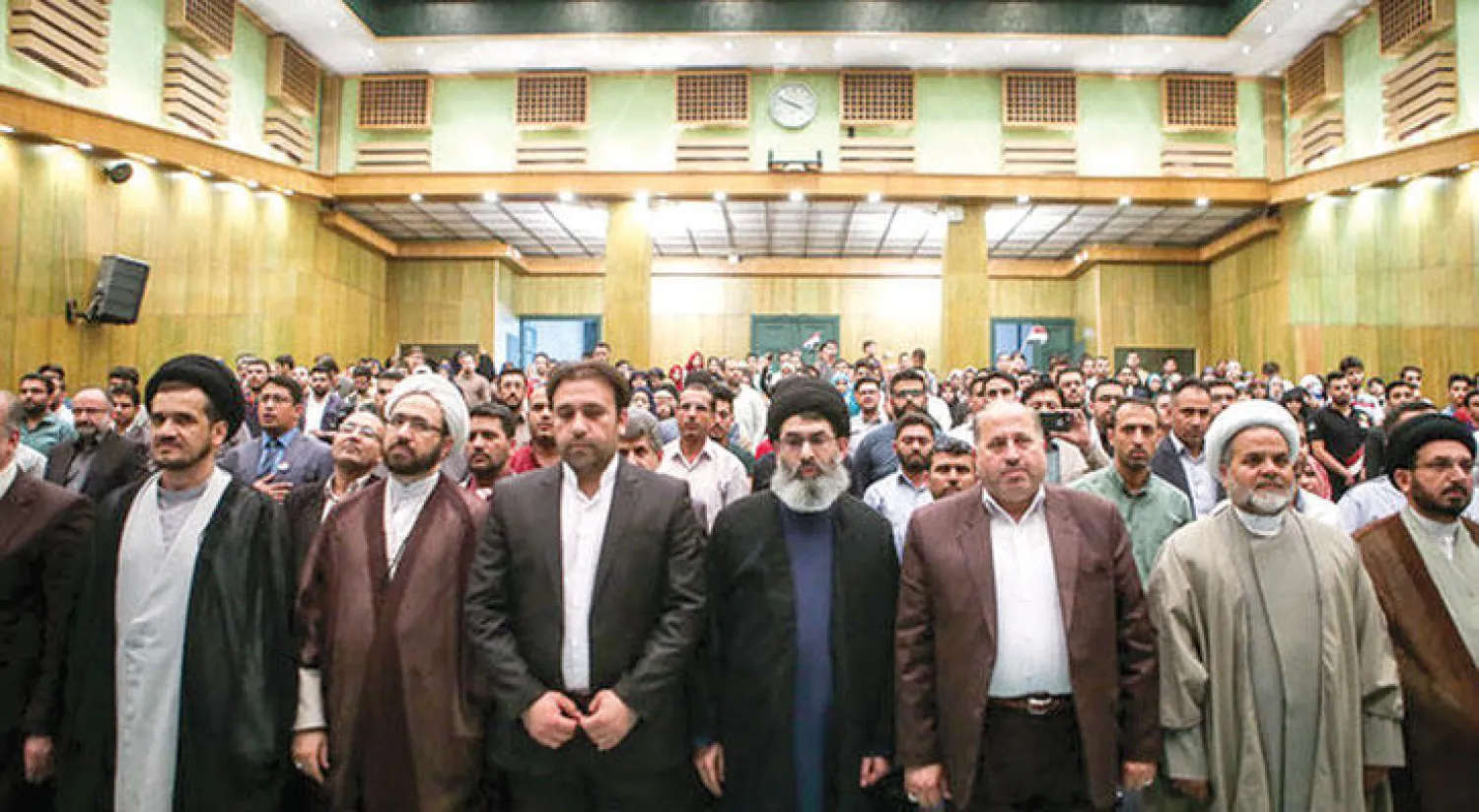 هاشم الحيدري قائد ميليشيا الحشد الشعبي خلال ملتقى «إنجازات الحشد الشعبي» في جامعة طهران