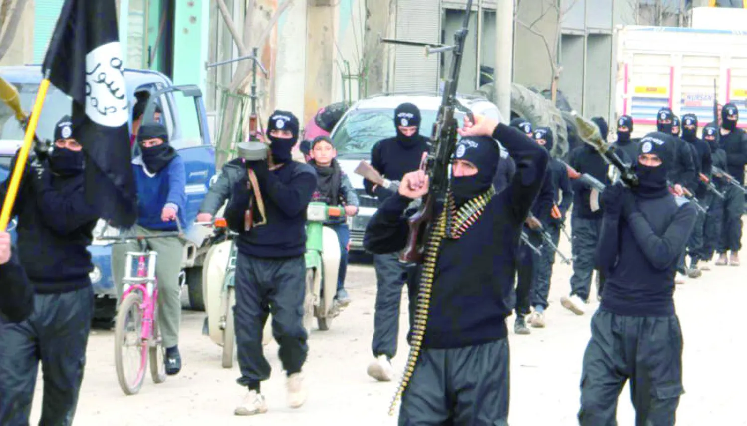 عناصر من داعش خلال دورية في تل أبيض في وقت سابق من العام الحالي (رويترز)