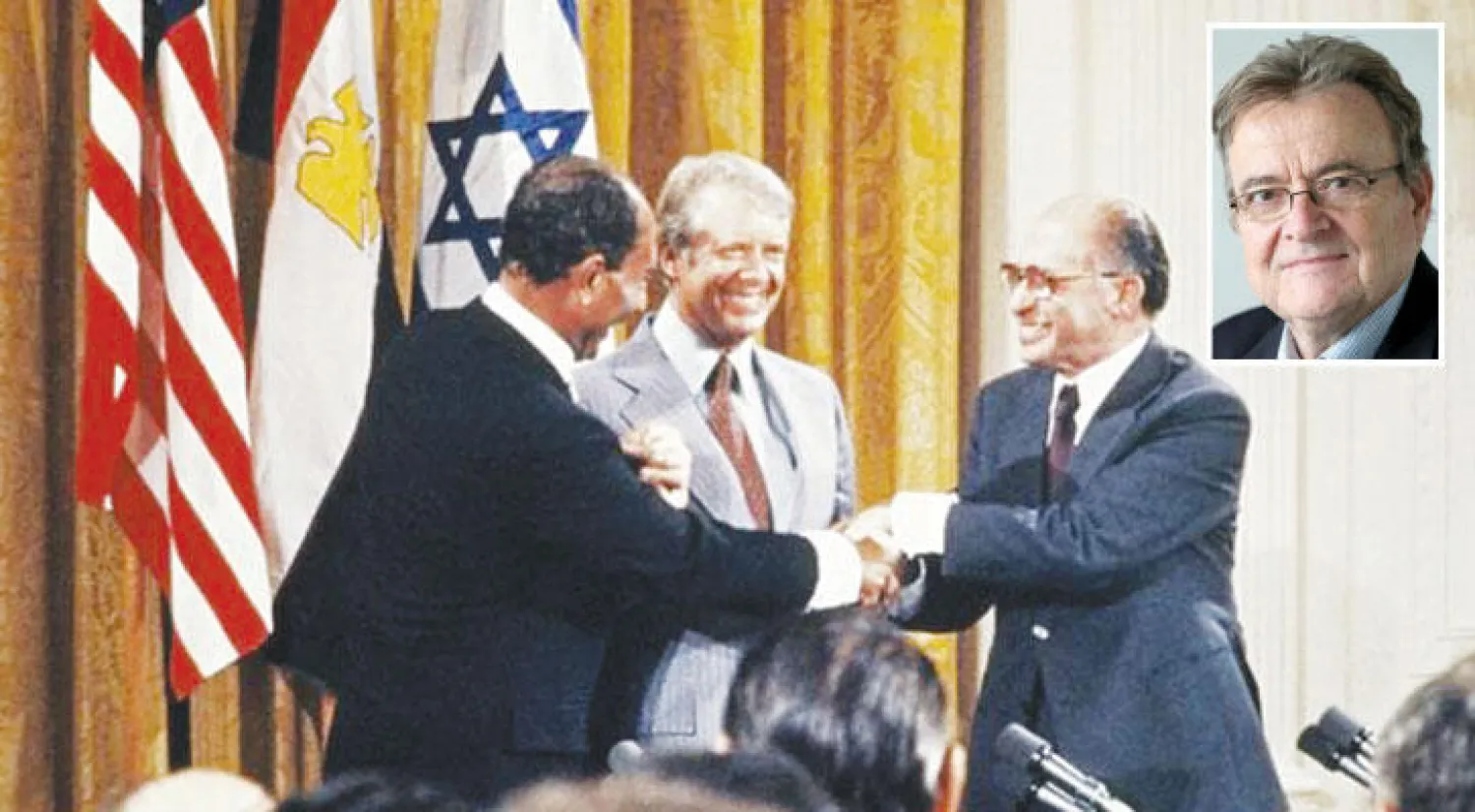 الرئيس المصري الراحل انور السادات والاميركي كارتر ورئيس الوزراء الاسرائيلي مناحم بيجن بعد التوقيع على اتفاقية كامب دافيد في  17 سبتمبر 1978.. وفي الصورة  توماس كلينغر («الشرق الأوسط»)