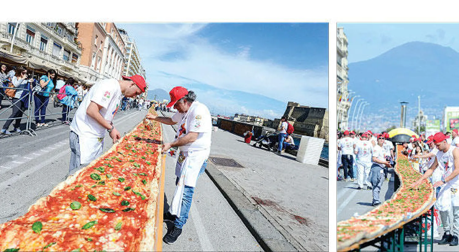 تطلب تحضيرها 200 لتر من زيت الزيتون و الطهاة يحضرون البيتزا العملاقة بالقرب من شاطئ نابولي أول من أمس (أ.ف.ب)