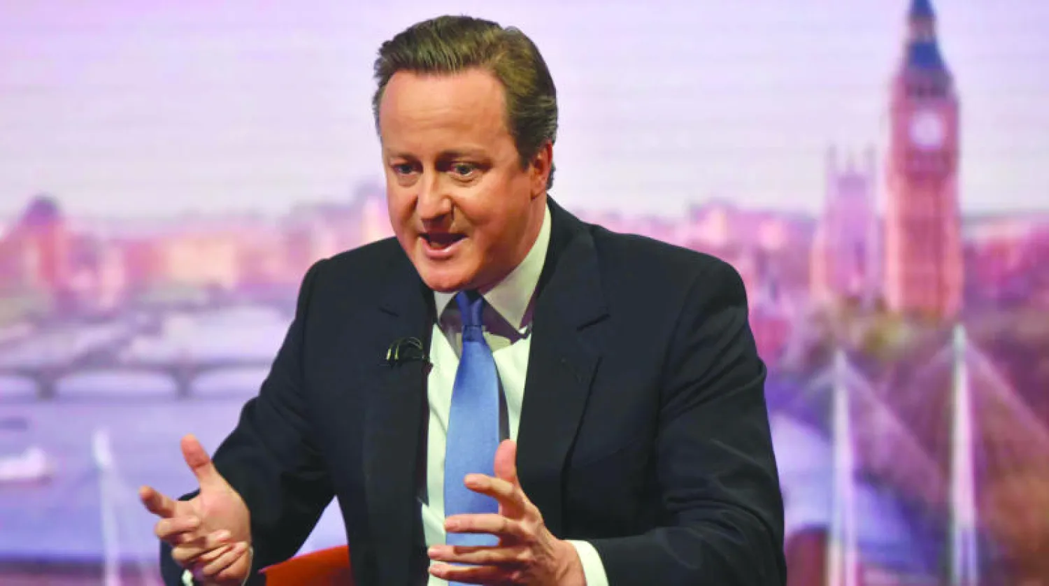 رئيس الوزراء البريطاني ديفيد كاميرون يتحدث عن الاستفتاء حول عضوية بلاده في الاتحاد الأوروبي في لندن أمس (رويترز)