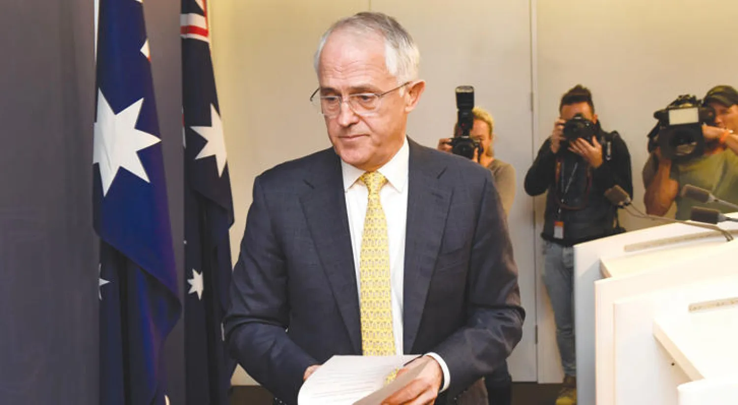 رئيس وزراء أستراليا مالكوم ترنبول بعد مؤتمر صحافي في سيدني أمس (أ.ف.ب)