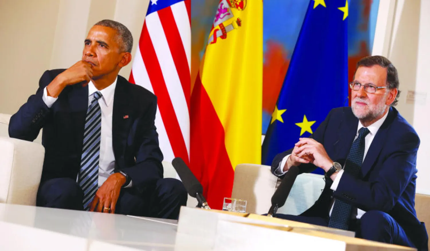 الرئيس الأميركي باراك أوباما يجيب عن أسئلة الصحافيين بعد لقائه رئيس الوزراء الإسباني ماريانو راخوي بقصر مونكلوا في أول زيارة له لمدريد (رويترز)