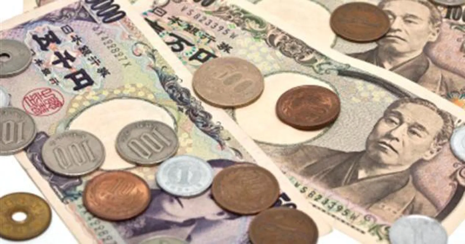 الين يهبط مع ارتفاع الأسهم اليابانية بفعل تجدد آمال التحفيز النقدي