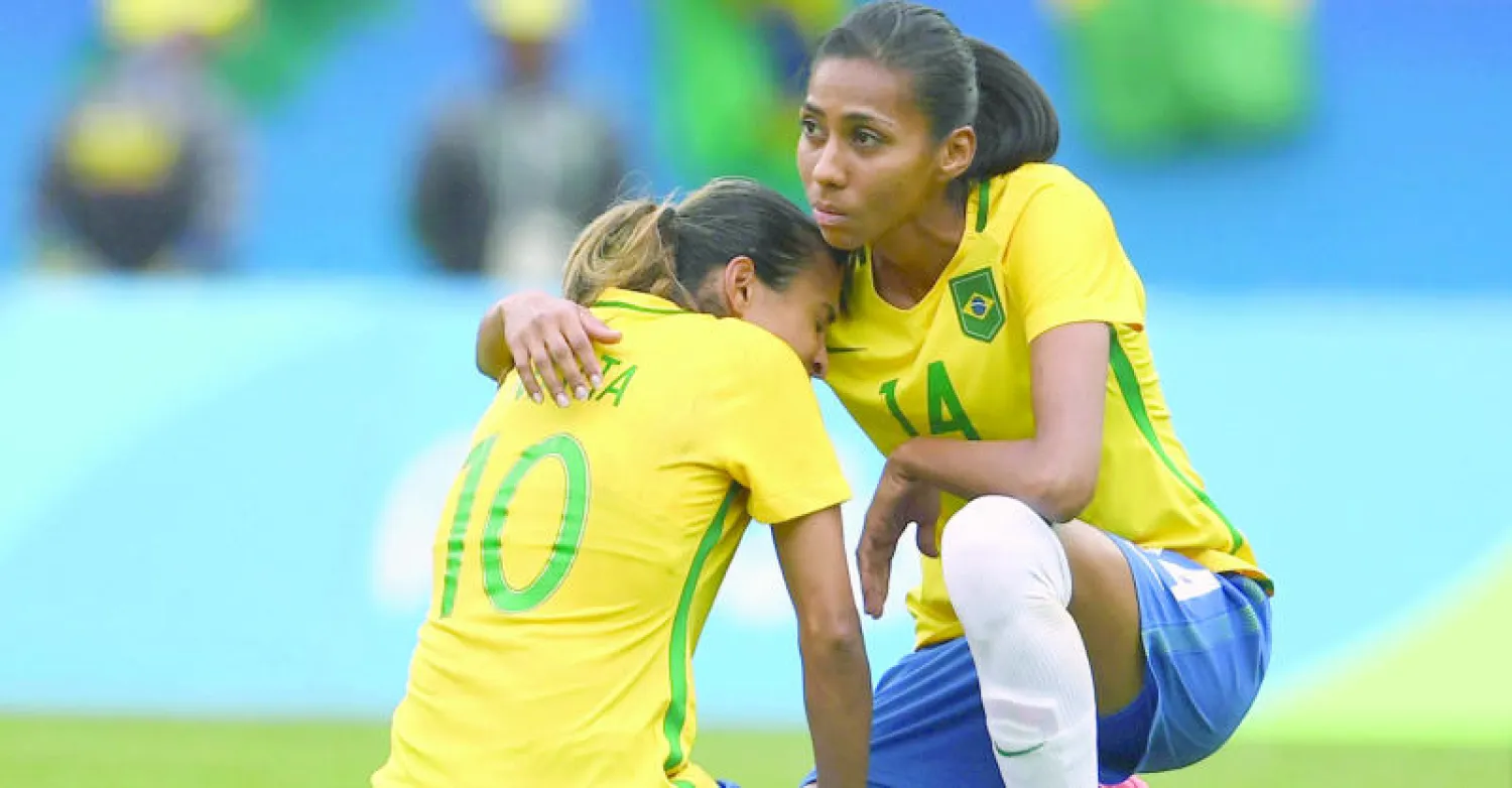 أحزان نسائية برازيلية (أ.ف.ب)