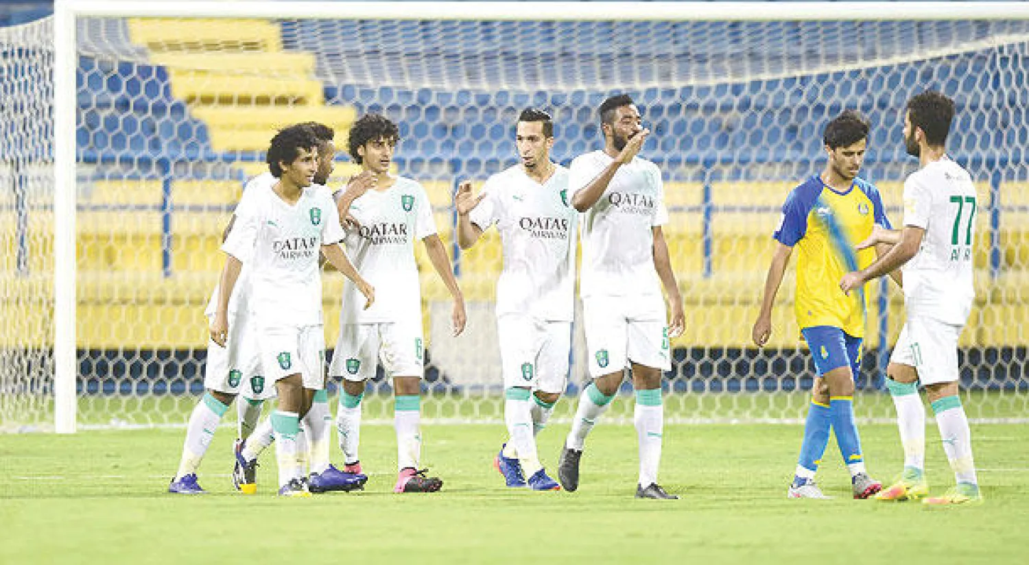 لاعبو الأهلي في مباراتهم الأخيرة أمام الغرافة القطري (المركز الإعلامي)