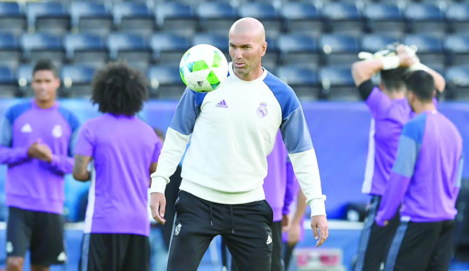 زيدان مدرب ريال مدريد (أ.ف.ب)
