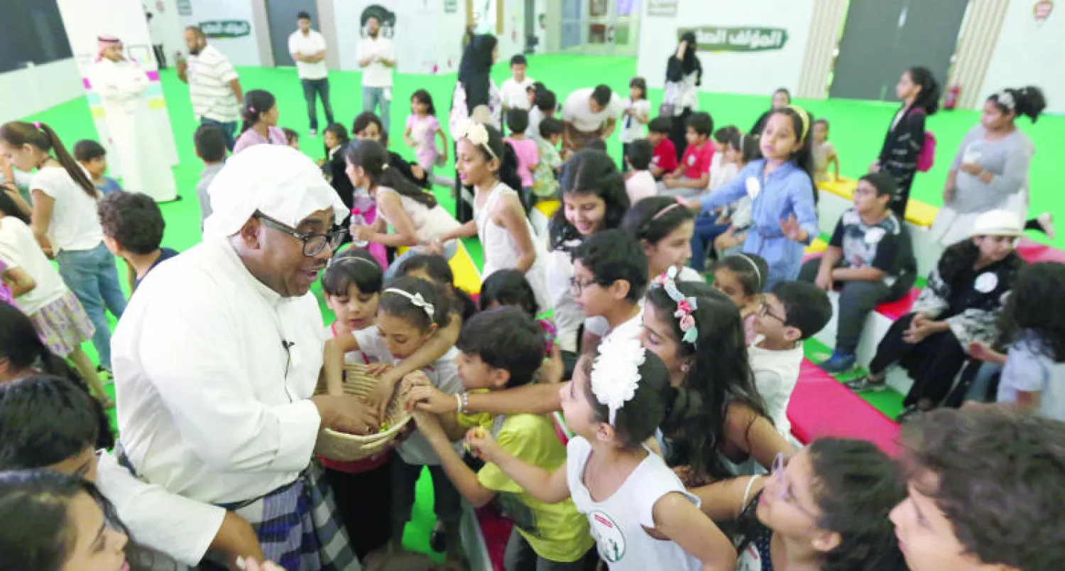 فعالية ترفيهية في قسم المؤلف الصغير  ({الشرق الأوسط})