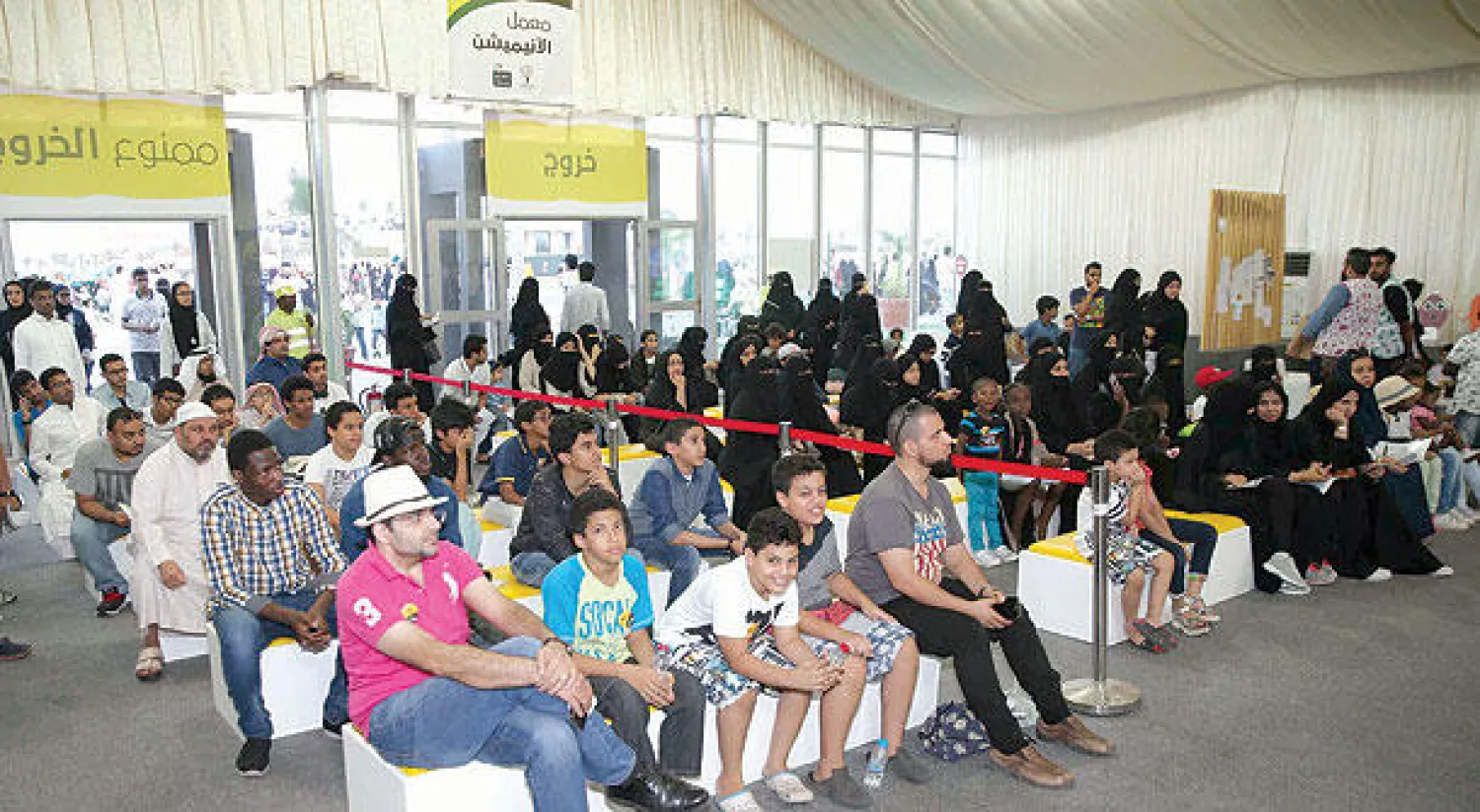 زوار يستمعون لإحدى الندوات عن مبادئ صناعة الرسوم المتحركة