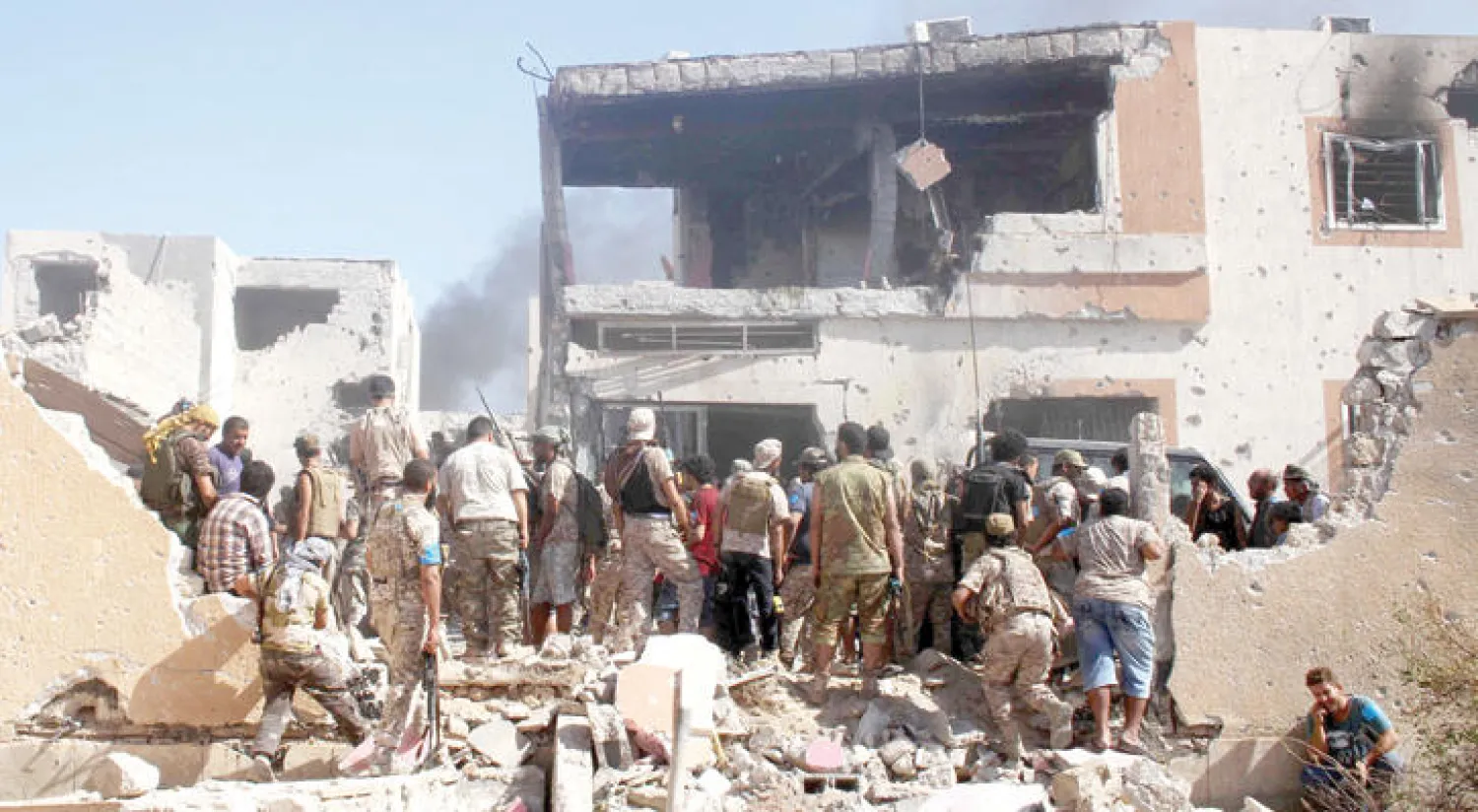 صورة أرشيفية للمواجهات بين قوات البنيان المرصوص وعناصر داعش في سرت (رويترز)