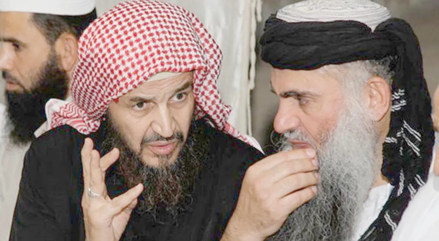 أبو قتادة وأبو محمد في لقاء سابق ({الشرق الأوسط})