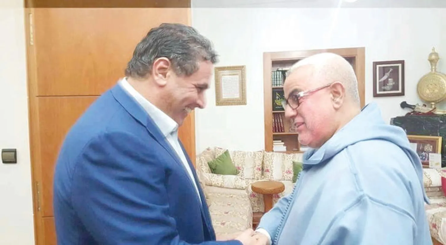 عبد الإله ابن كيران في لقاء سابق مع عزيز أخنوش («الشرق الأوسط»)