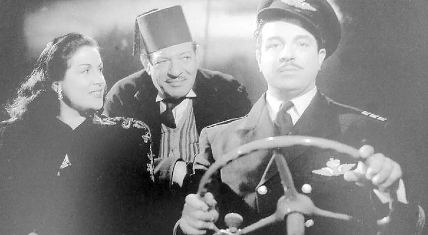 مشهد مع أنور وجدي ونجيب الريحاني من فيلم «غزل البنات»