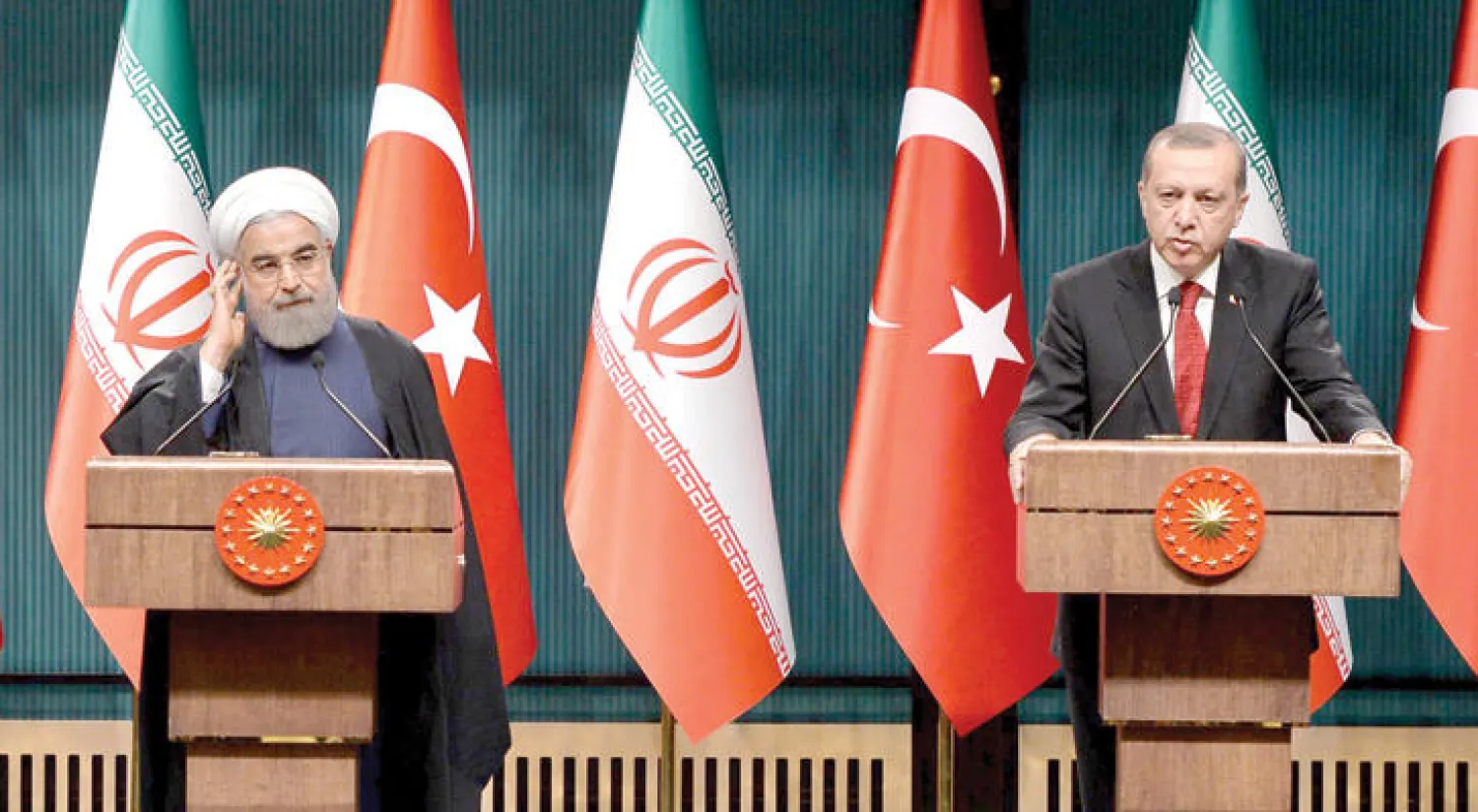 صورة أرشيفية للرئيس التركي ونظيره الإيراني خلال مؤتمر صحافي (أ.ف.ب)