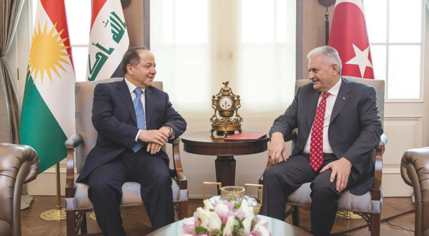 رئيس الوزراء التركي خلال لقائه رئيس إقليم كردستان في أنقرة أمس (أ.ب)