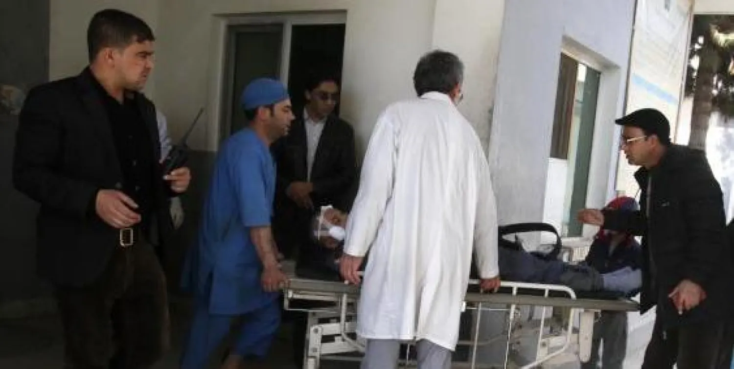 ضحايا تفجيري العاصمة الأفغانية كابل (إ.ب.أ)