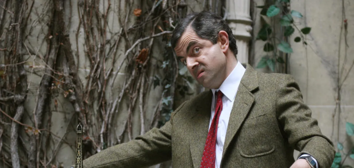 روان أتكينسون  في شخصية مستر بين (أ.ف.ب)