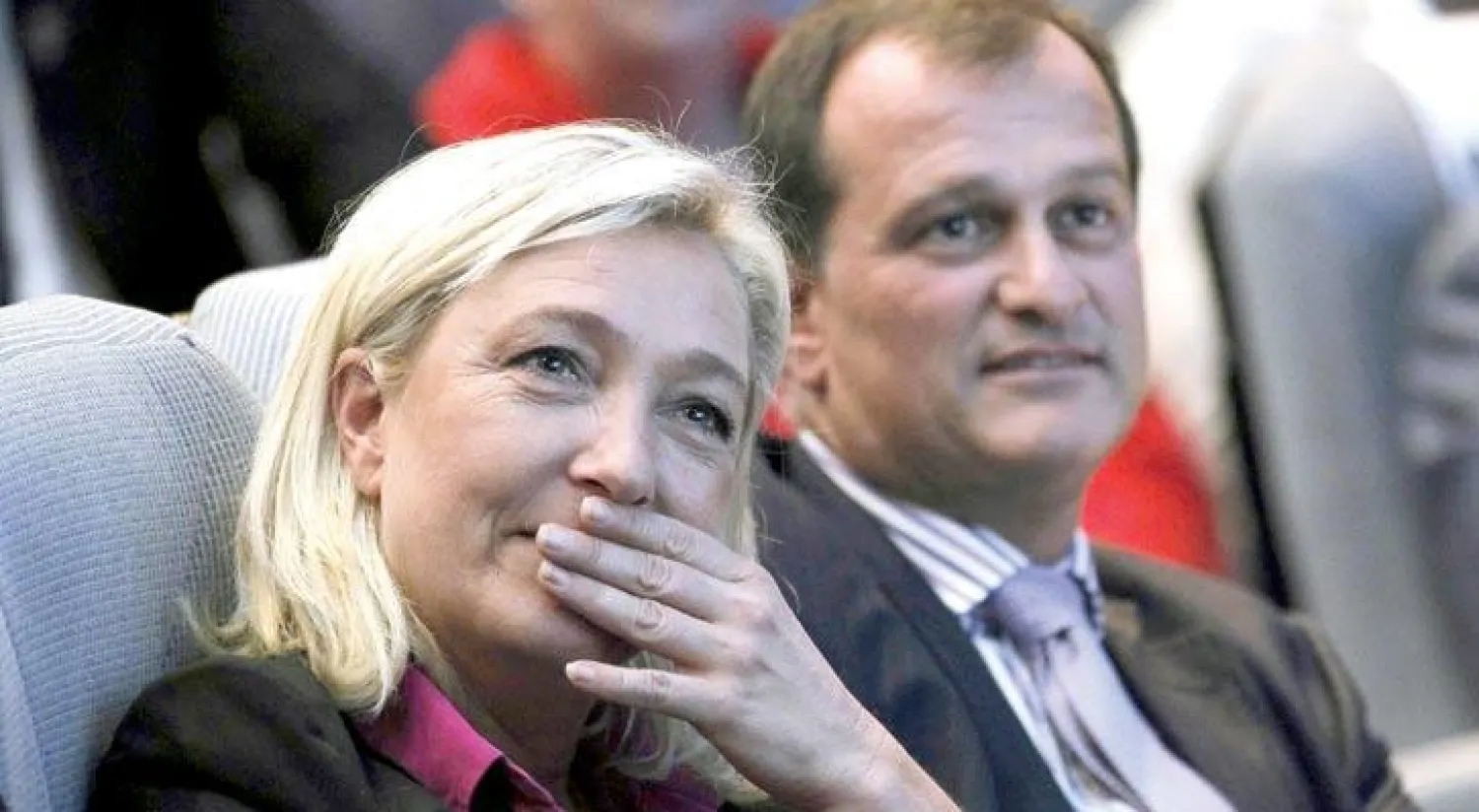 مارين لوبان وزوجها لوي آليو