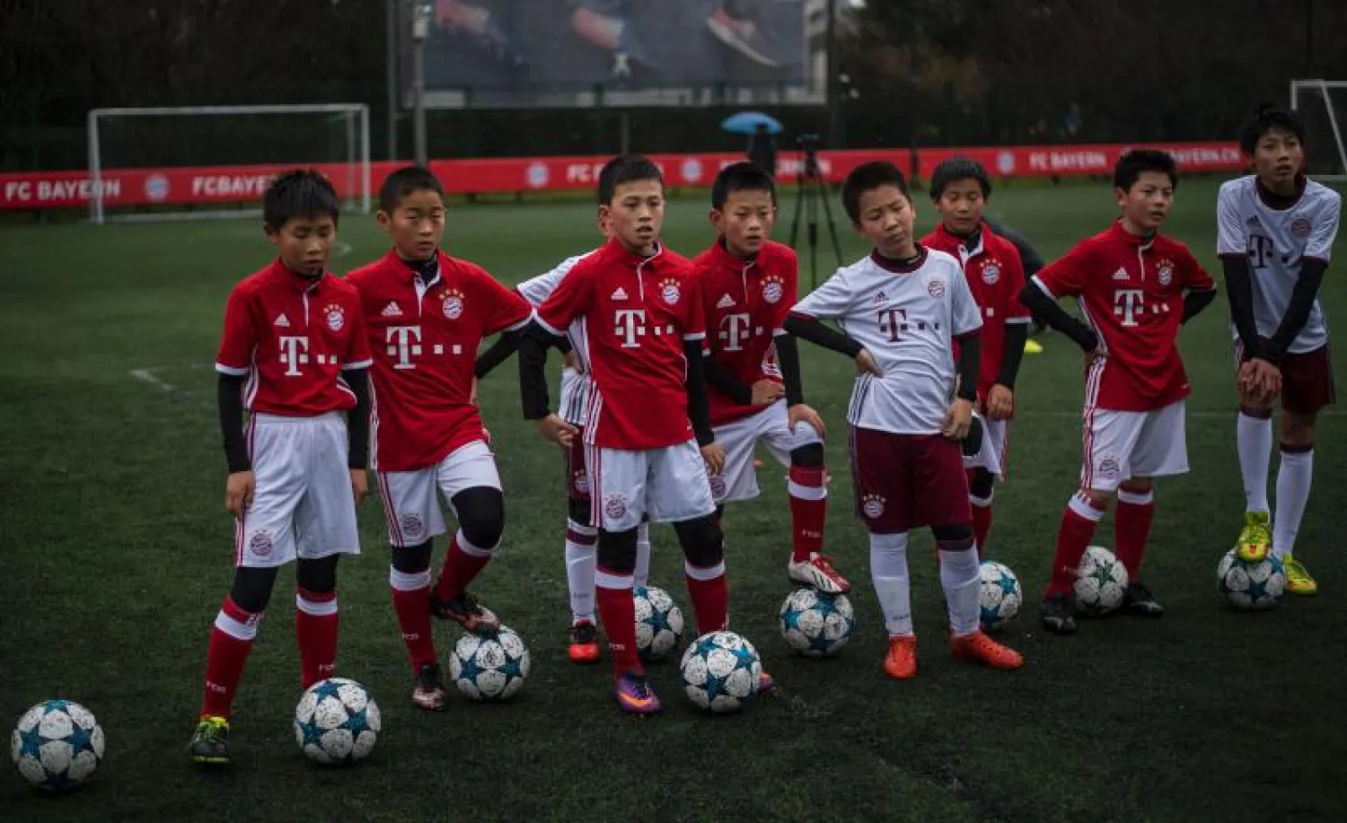 بايرن ميونيخ يفتتح مدرسة لكرة القدم بمدينة شينغن الصينية (أ.ف.ب)