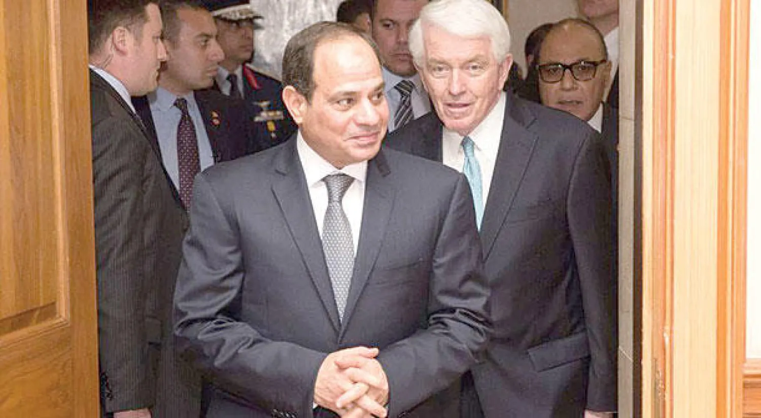 الرئيس السيسي وإلى جواره توماس دناهيو رئيس الغرفة التجارية الأميركية