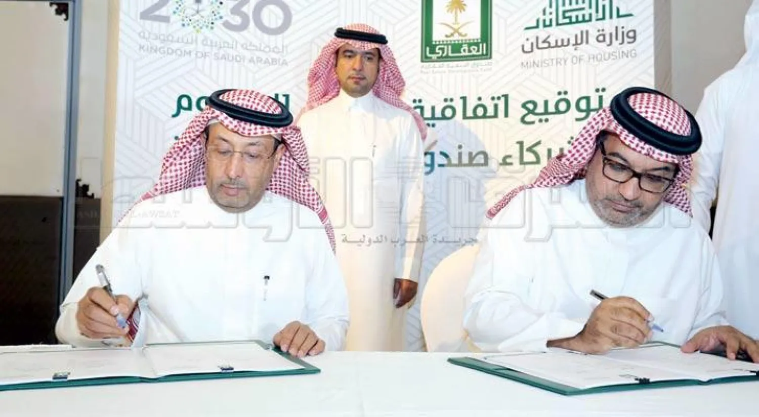 جانب من توقيع الاتفاقيات التي أنجزتها وزارة الإسكان السعودية بالرياض أمس (تصوير: أحمد فتحي)