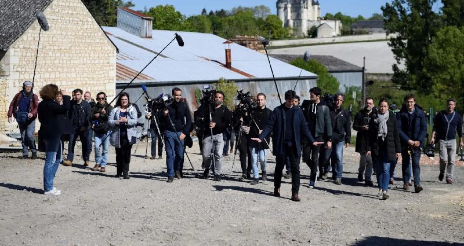 مجموعة من الصحافيين والمصوريين (أ.ف.ب)