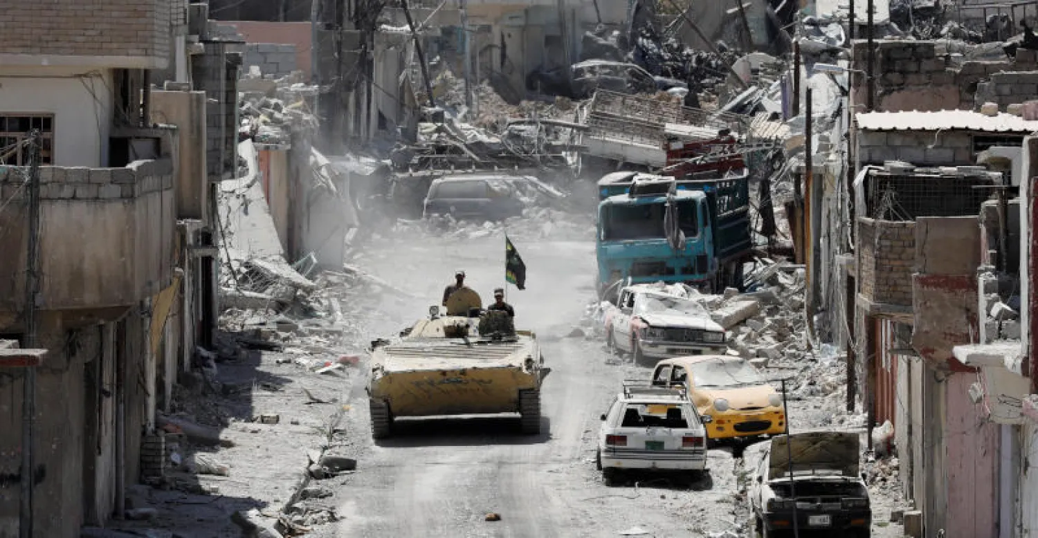 القوات العراقية تواصل عملياتها العسكرية لتحرير ما تبقى من حيي الزنجيلي والشفاء بالموصل (رويترز)