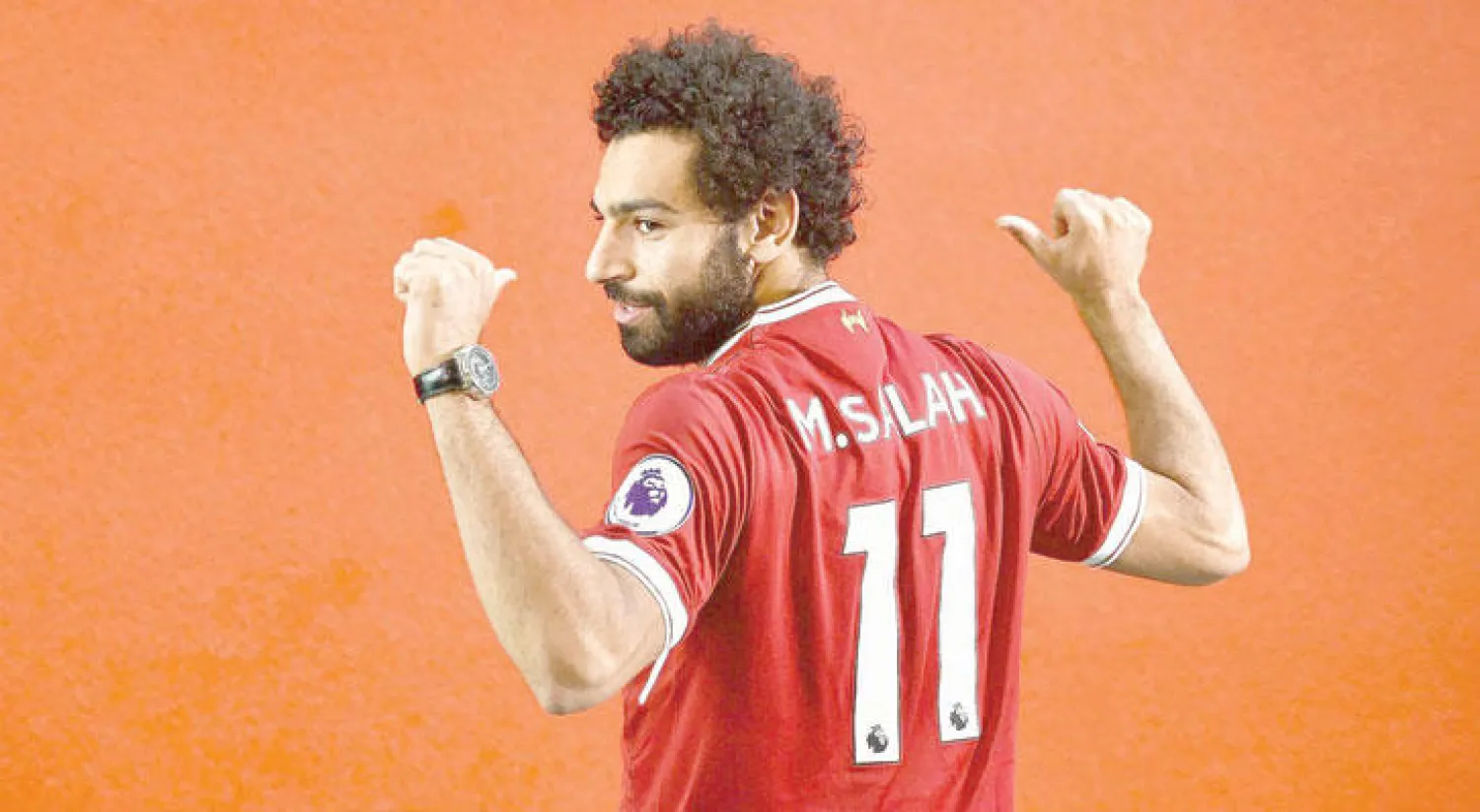 صلاح يستعرض قميصه رقم 11 في ليفربول («الشرق الأوسط»)