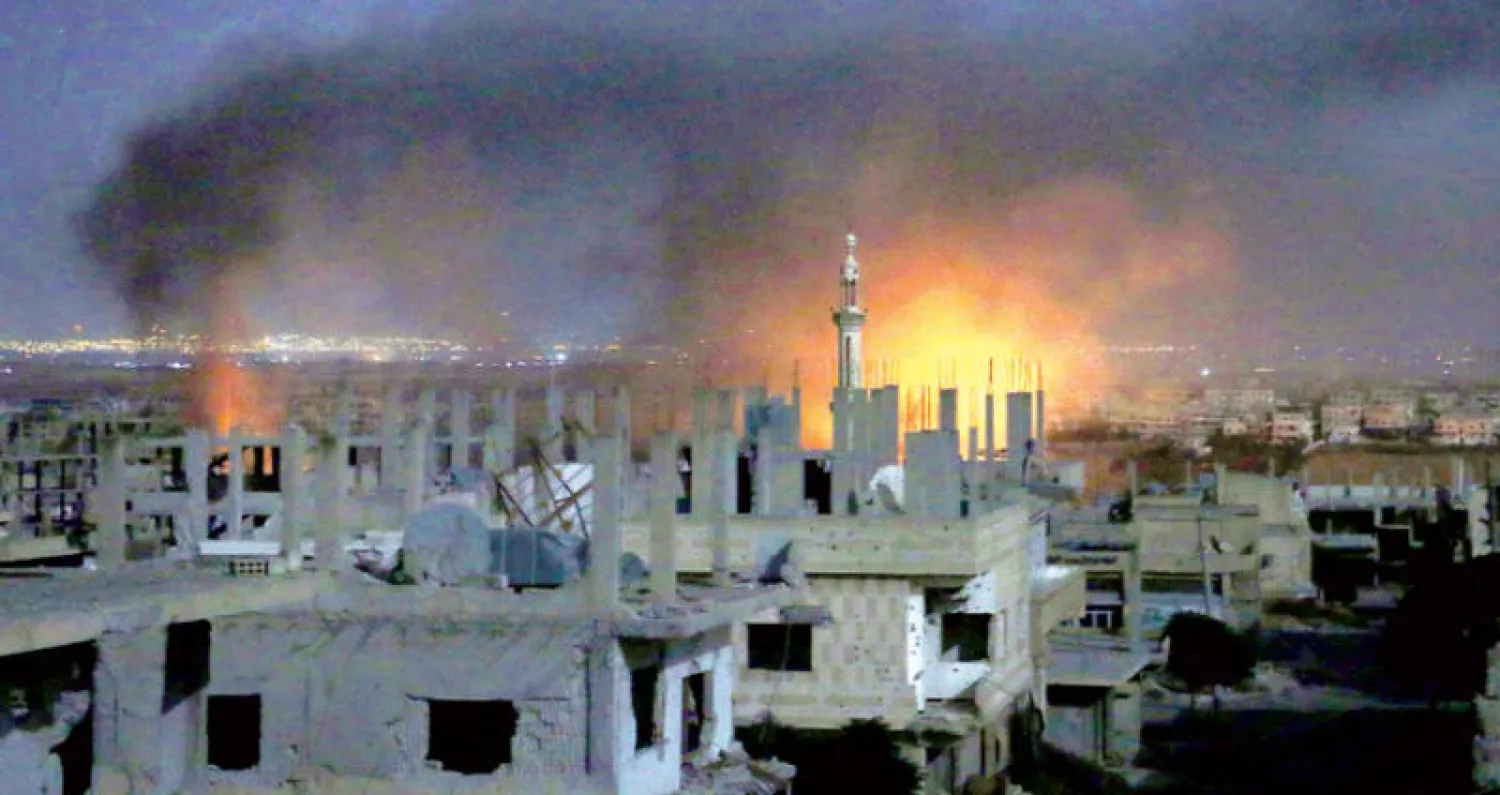 بعد غارة من قوات النظام على درعا أمس (أ.ف.ب)