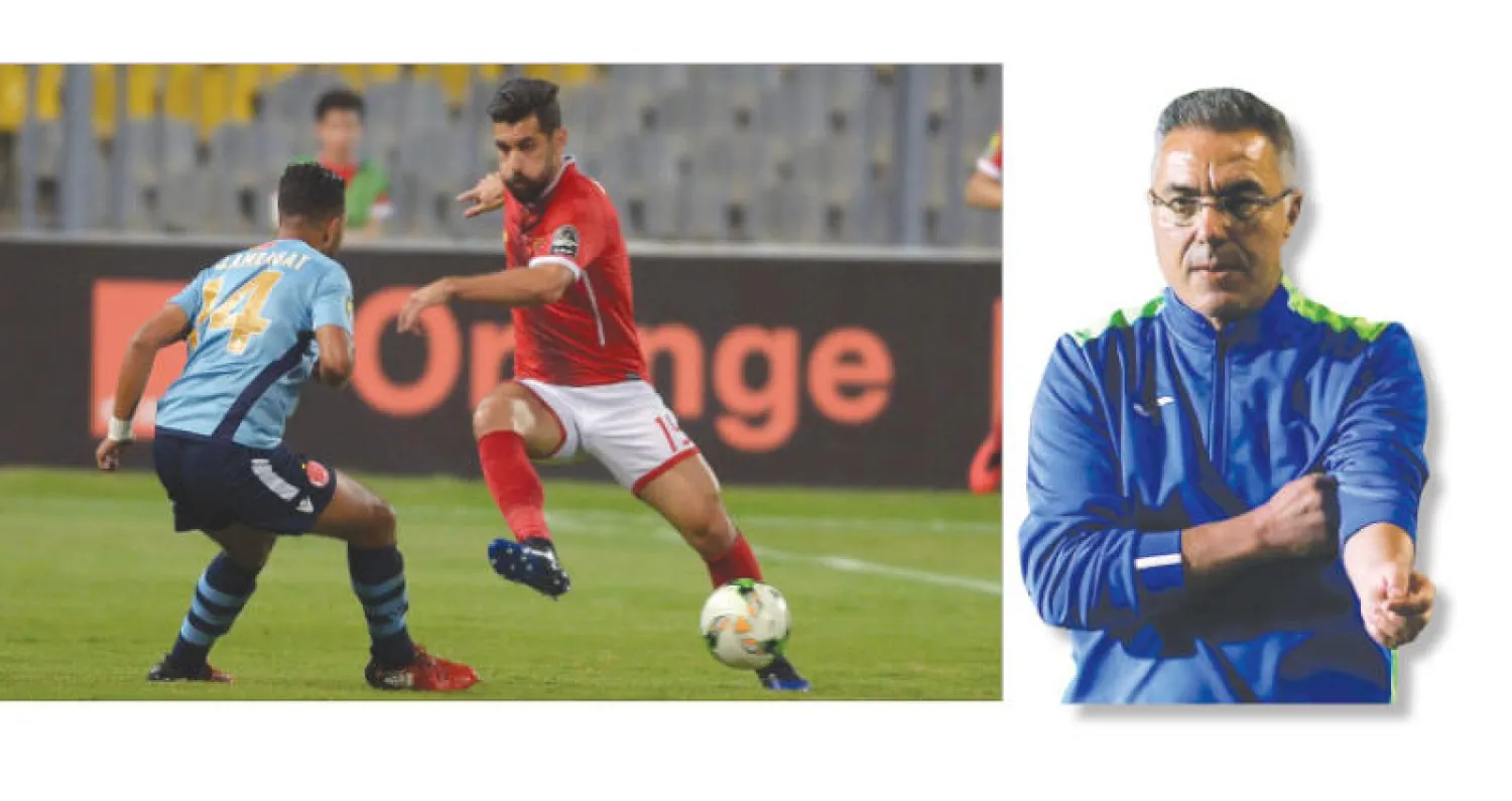 إيناسيو يواجه الإقالة في حال فشل الزمالك في التأهل (رويترز) - السعيد نجم الأهلي (يمين) في مواجهة لاربات لاعب الوداد في لقطة من جولة سابقة (أ.ف.ب)